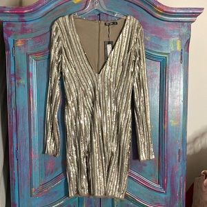 Sequin plunge body on mini dress.